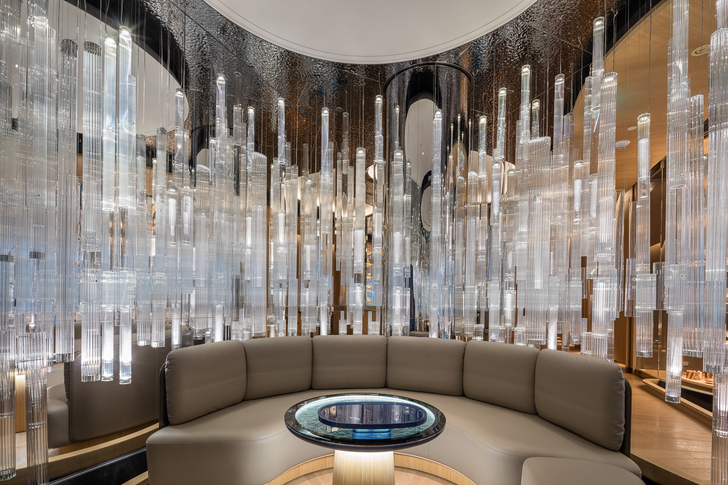 Custom lighting, created in collaboration with design studio Jouin Manku, illuminates Alain Ducasse's restaurant at the Morpheus Hotel in Macao.